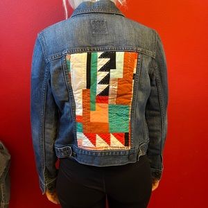 Jean Jacket. Old Navy brand with With beautiful decorative pattern.Size M.